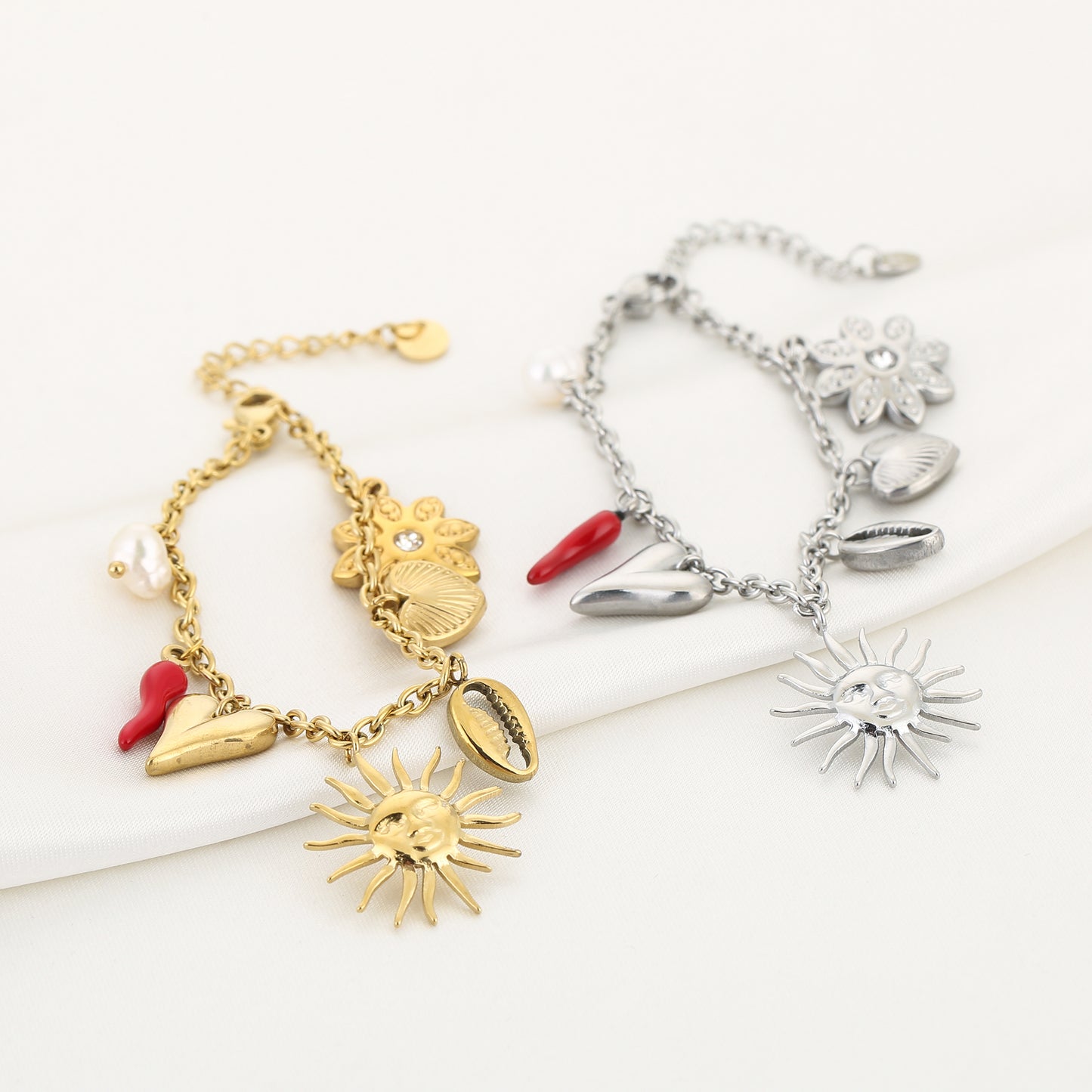 Bedelarmbandje goud/rood stainless steel