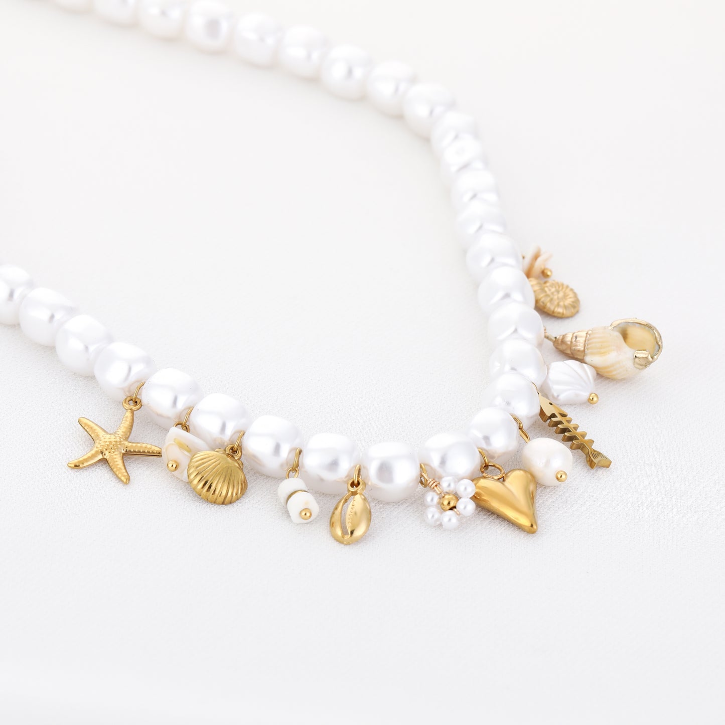Parelketting met bedeltjes stainless steel
