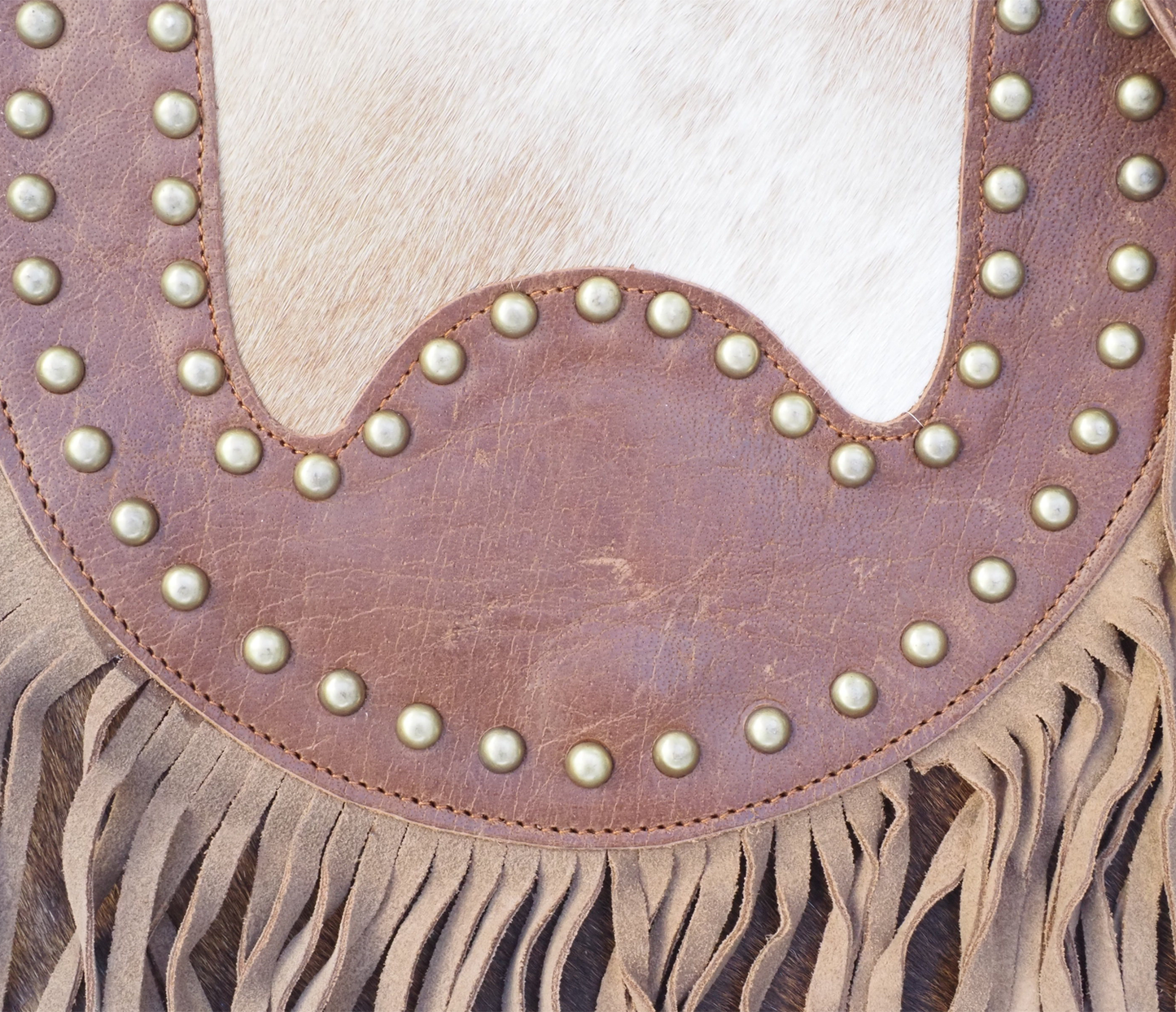Stoere leren cowboybag met franjes